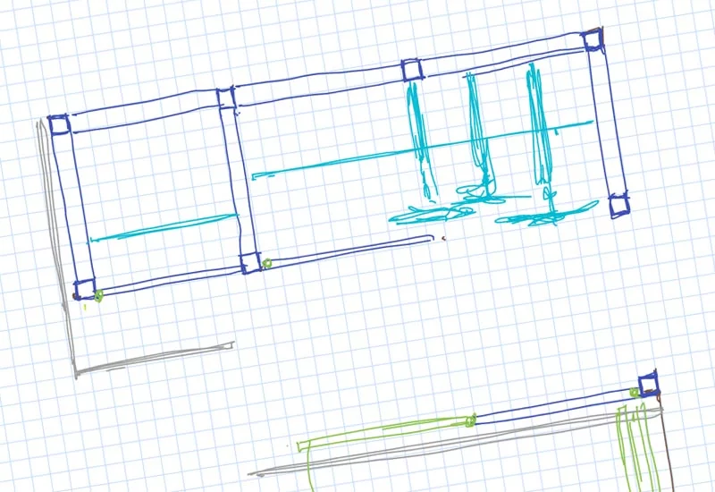 A hand-drawn sketch on graph paper depicts a swimming pool adjacent to a garden building, with two sections divided by a line. The drawing includes details such as a ladder and vertical structures possibly representing diving boards or starting blocks. - a room in the garden