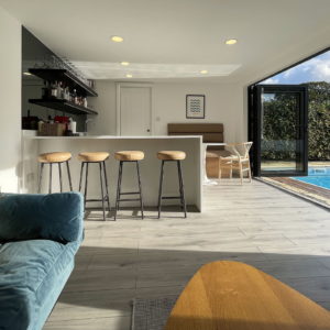 Unique pool house with sitting area and bar