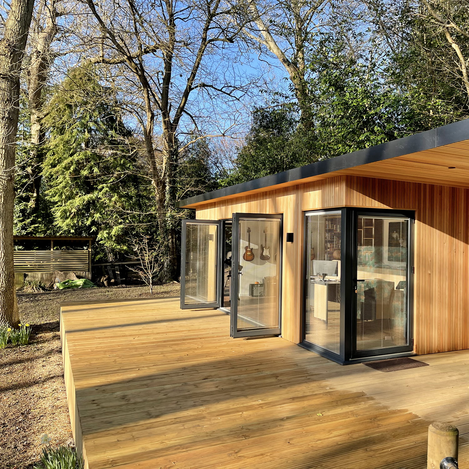 Unique bespoke large garden office with decking