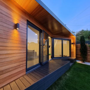 Unique designer garden room gym with decking