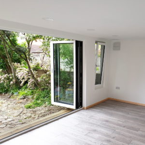 Interior layout of unique garden room with bi-folding doors and open/tilt windows