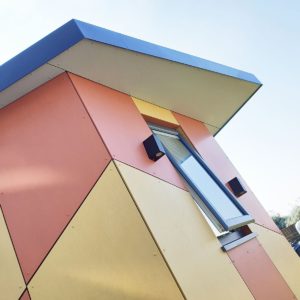 Colourful Facia board cladding for garden art studio
