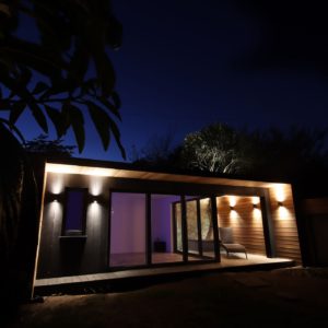 Exterior of unique garden room summerhouse with external lights
