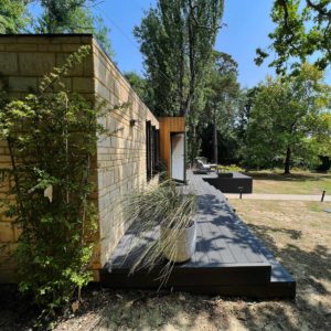 Bespoke mobile home with decking and stone cladding