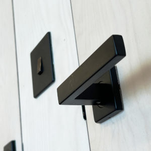 Black door handles in garden room