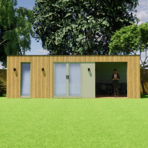 A modern small structure with a wooden slat exterior, large glass doors, and surrounding greenery. A person stands under a partially covered patio area, engaged with a laptop. The lawn in the foreground is neatly mowed, and large trees are visible behind the building. - a room in the garden