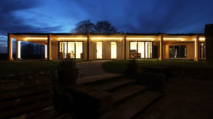 Designer luxurious garden office with bespoke lights