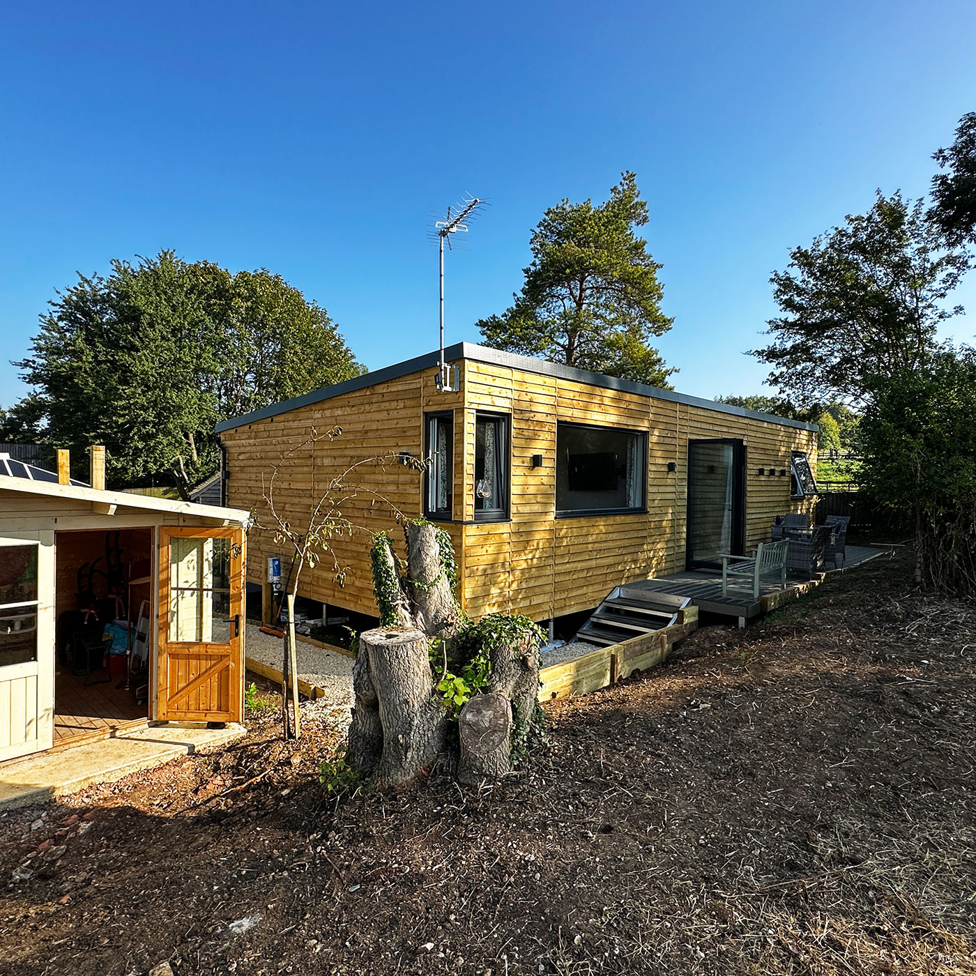 Designer bespoke mobile home with external wood cladding