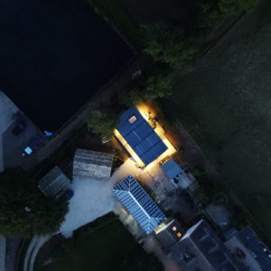 Designer mobile home next to beautiful field