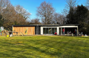 Large designer garden room golf simulator under construction