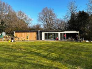 Large designer garden room golf simulator under construction