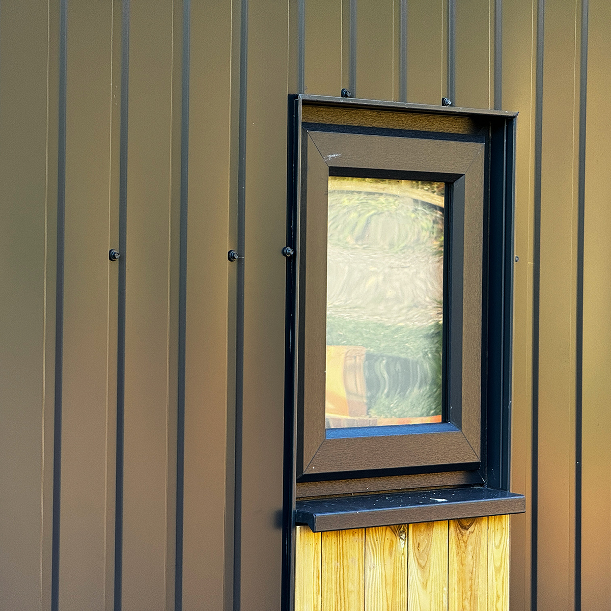 Pocket windows for designer mobile home with corrugated board