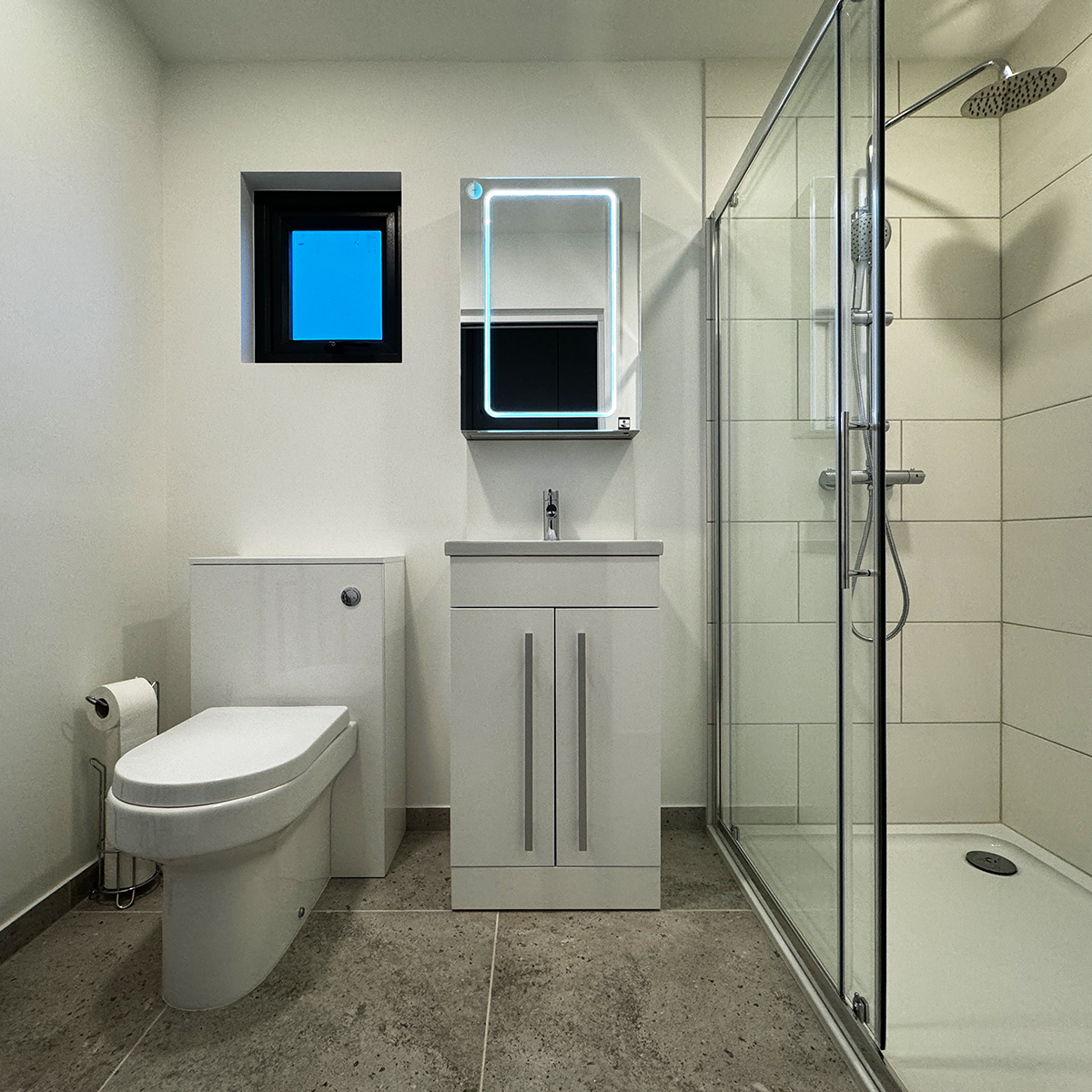 Standard bathroom with pocket window inside mobile home